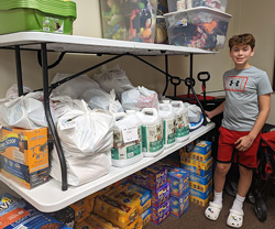 Jake Bertin - Readying Pet Food and Supplies for Delivery to the Homebound and Elderly